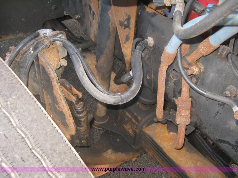 image for item L6357 2002 GMC C7500 dump truck