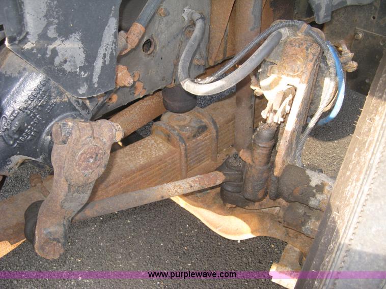 image for item L6357 2002 GMC C7500 dump truck