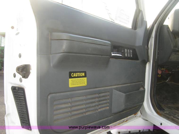 image for item L6357 2002 GMC C7500 dump truck