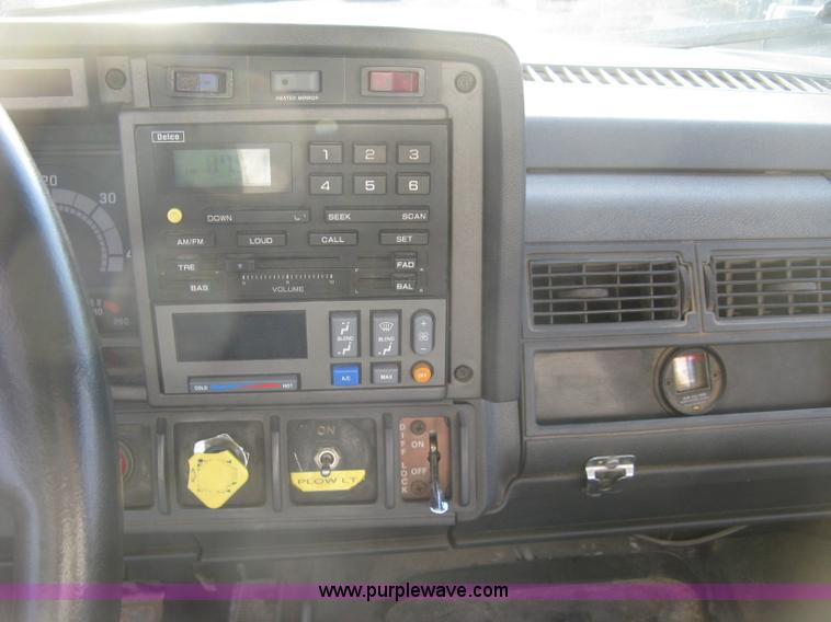 image for item L6357 2002 GMC C7500 dump truck