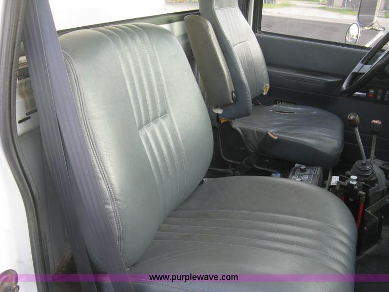 image for item L6357 2002 GMC C7500 dump truck