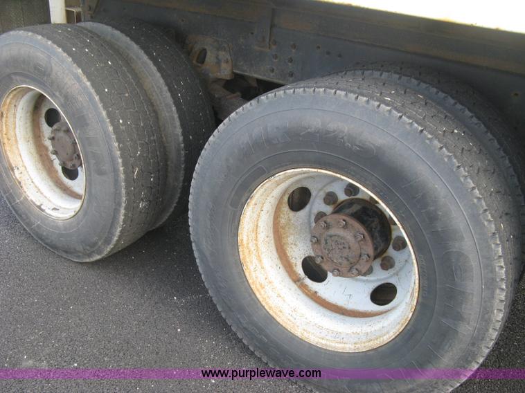 image for item L6357 2002 GMC C7500 dump truck