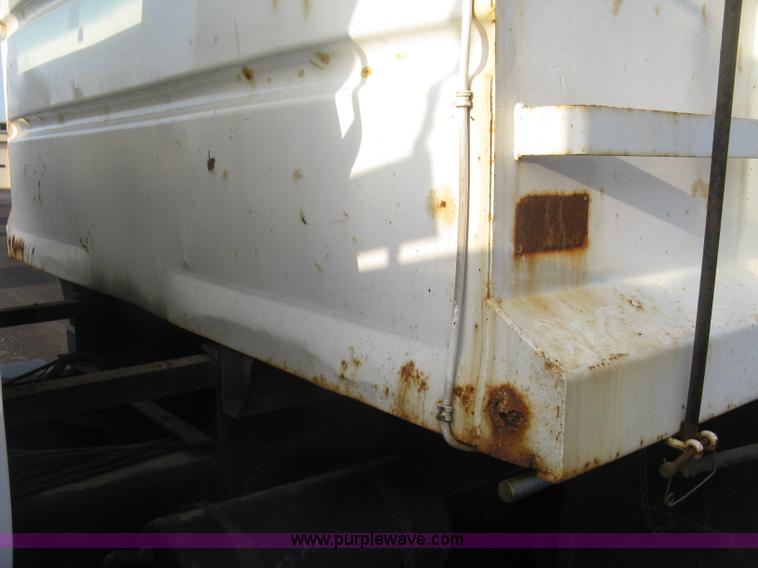 image for item L6357 2002 GMC C7500 dump truck