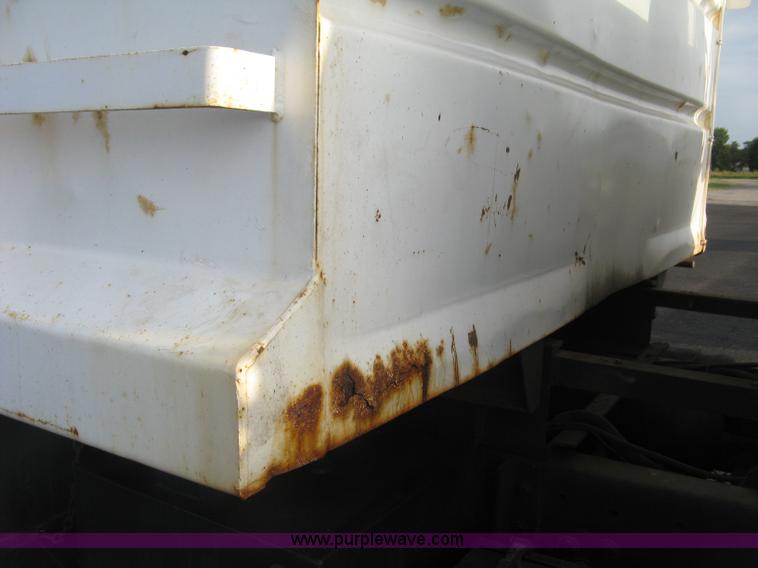 image for item L6357 2002 GMC C7500 dump truck