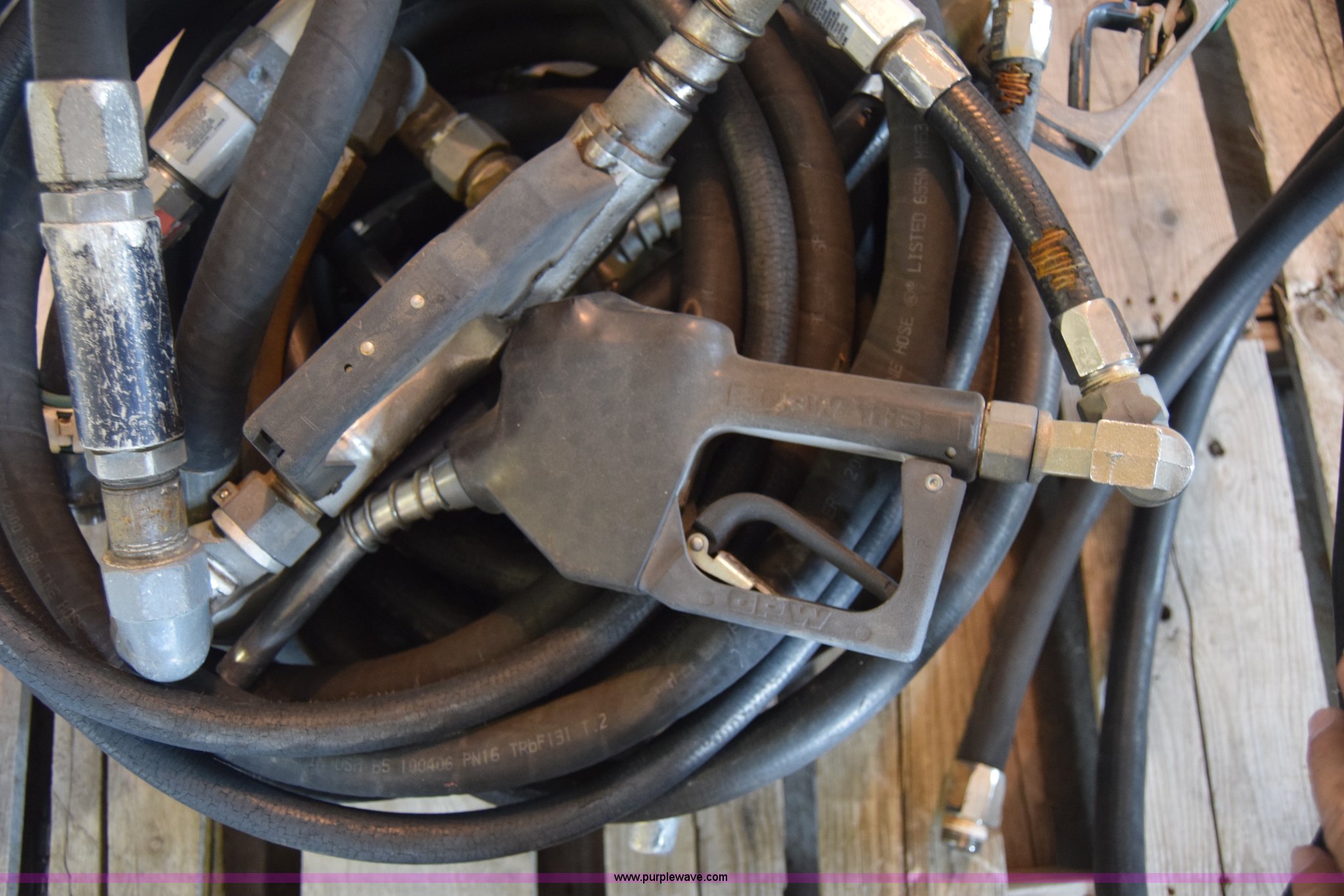 (10) gas pump hoses in Wichita, KS Item BO9740 sold Purple Wave