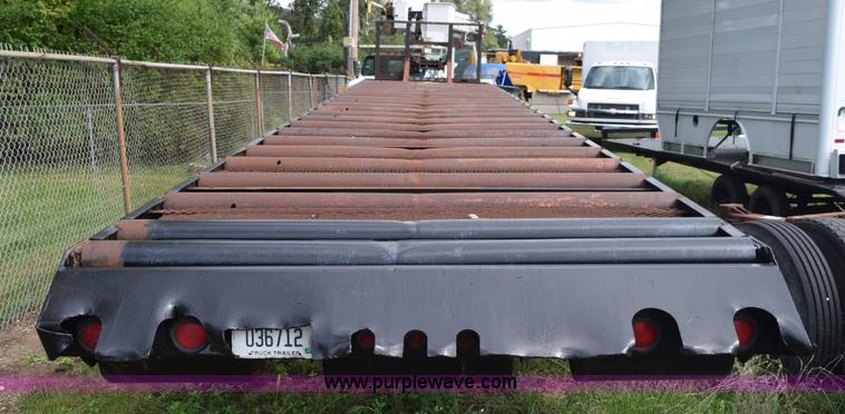 image for item K6642 1993 Wabash flatbed roller deck trailer
