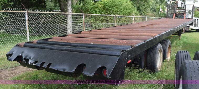 image for item K6642 1993 Wabash flatbed roller deck trailer
