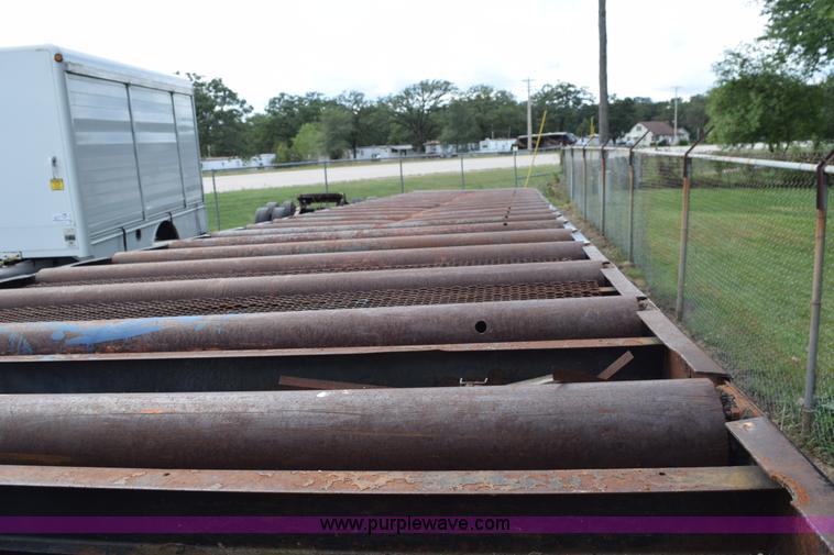 image for item K6642 1993 Wabash flatbed roller deck trailer