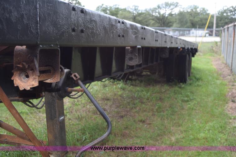 image for item K6642 1993 Wabash flatbed roller deck trailer