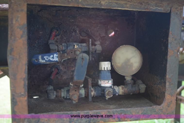 image for item K6642 1993 Wabash flatbed roller deck trailer