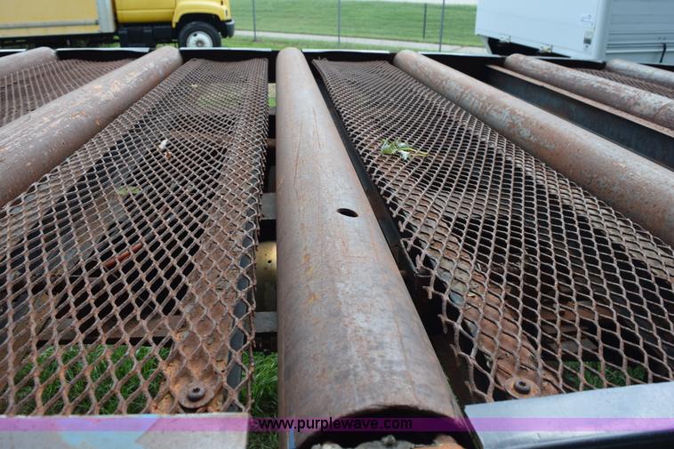 image for item K6642 1993 Wabash flatbed roller deck trailer