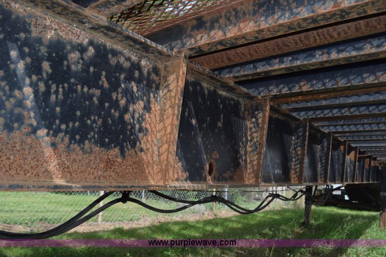 image for item K6642 1993 Wabash flatbed roller deck trailer