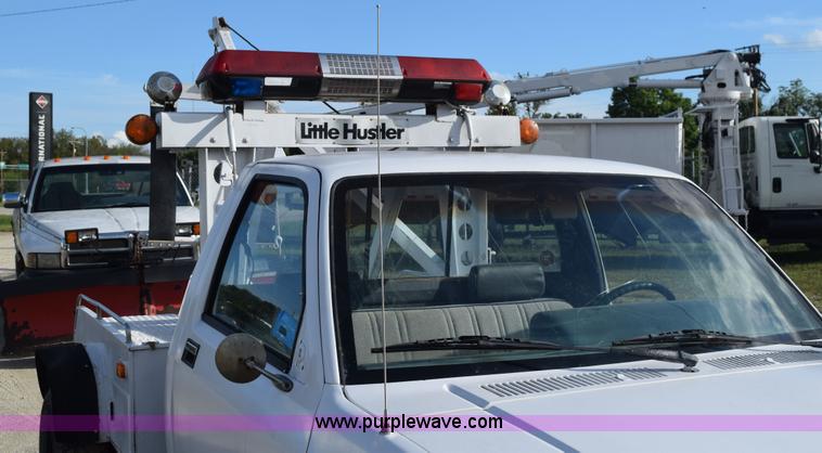 image for item K6652 1990 Dodge Dakota wrecker pickup truck