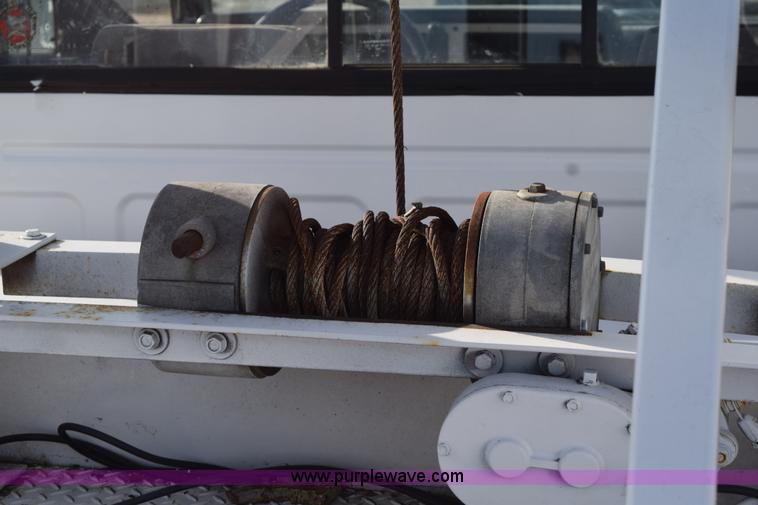 image for item K6652 1990 Dodge Dakota wrecker pickup truck