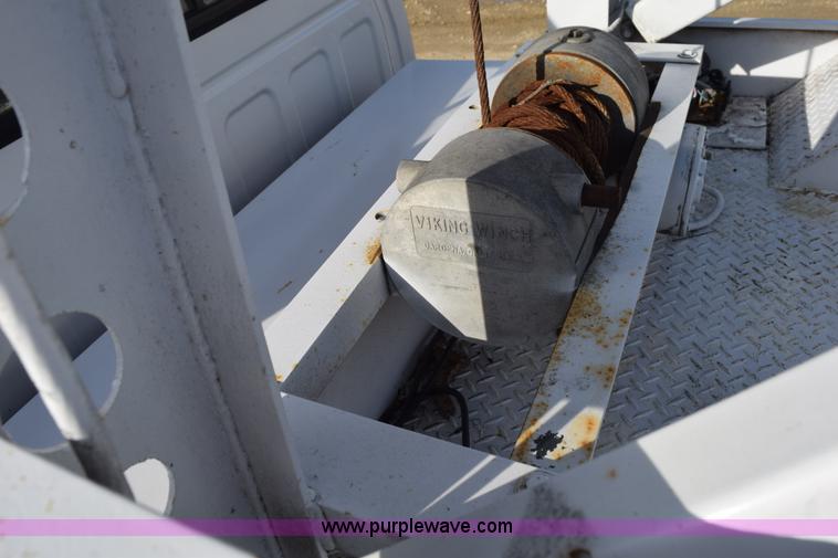 image for item K6652 1990 Dodge Dakota wrecker pickup truck