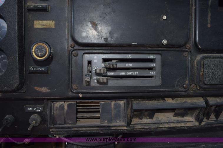 image for item K6653 1985 International S1900 flatbed truck with crane