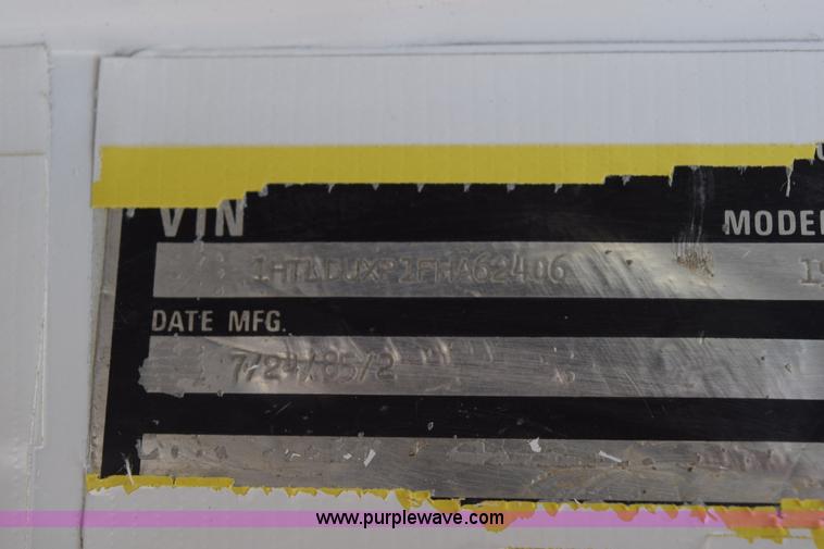 image for item K6653 1985 International S1900 flatbed truck with crane