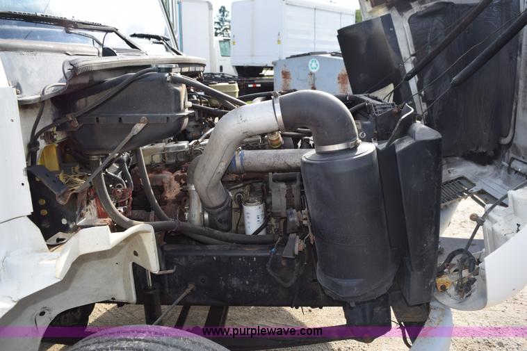 image for item K6655 1997 Freightliner FL60 chipper truck