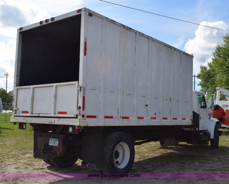 image for item K6657 1999 International 4700 dump bed chipper truck