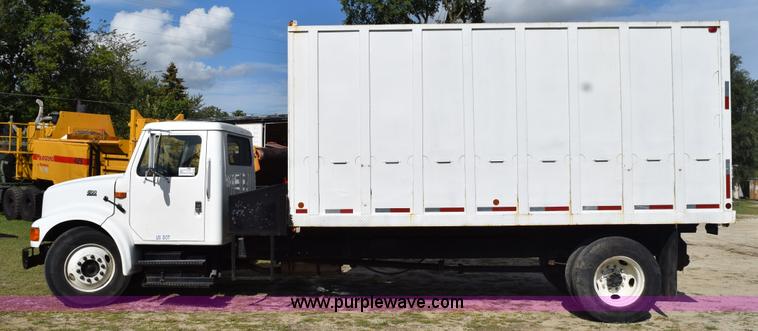 image for item K6657 1999 International 4700 dump bed chipper truck