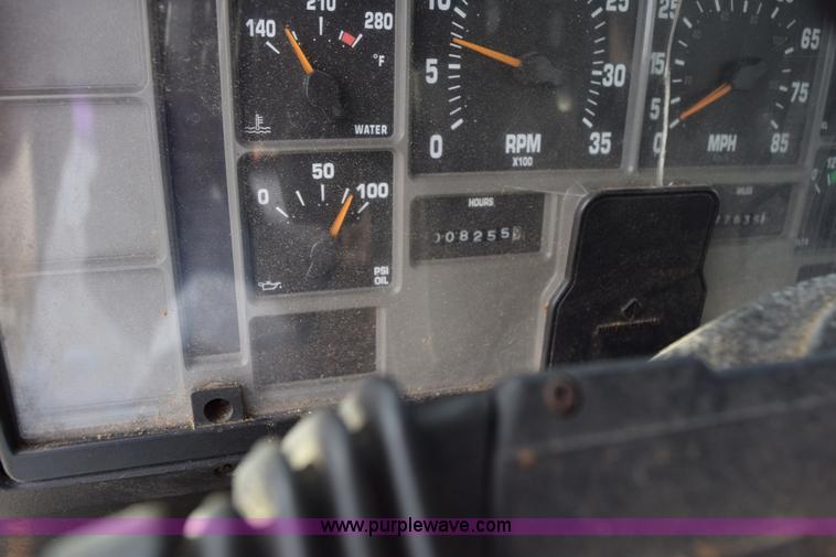 image for item K6657 1999 International 4700 dump bed chipper truck