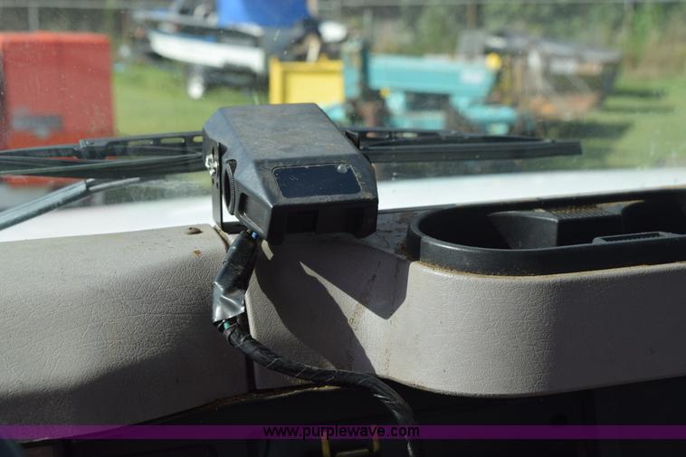 image for item K6657 1999 International 4700 dump bed chipper truck