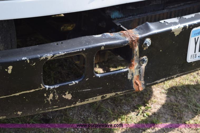 image for item K6657 1999 International 4700 dump bed chipper truck