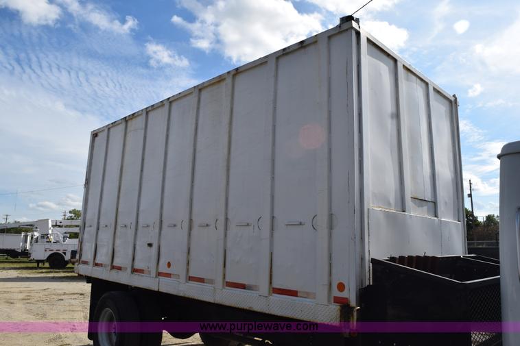 image for item K6657 1999 International 4700 dump bed chipper truck