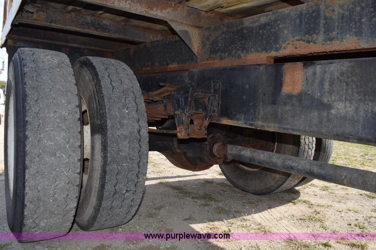 image for item K6657 1999 International 4700 dump bed chipper truck