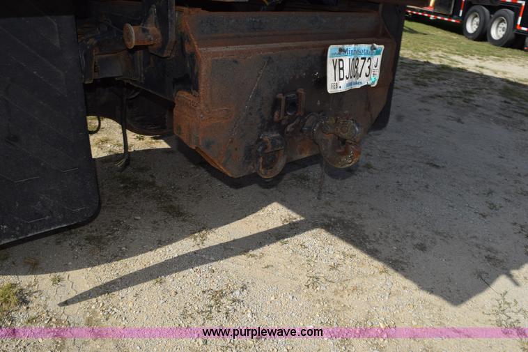 image for item K6657 1999 International 4700 dump bed chipper truck