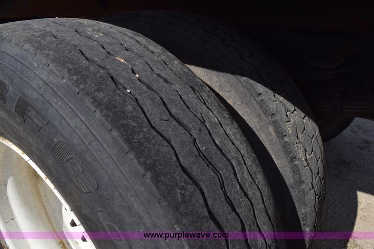 image for item K6657 1999 International 4700 dump bed chipper truck