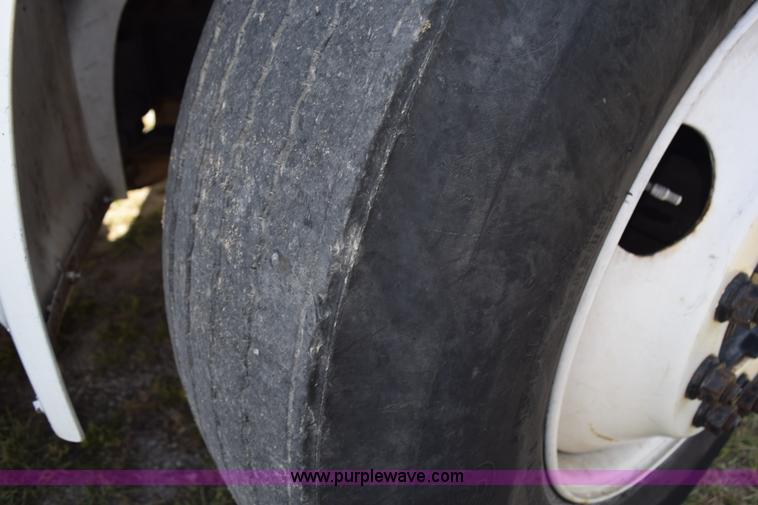 image for item K6657 1999 International 4700 dump bed chipper truck