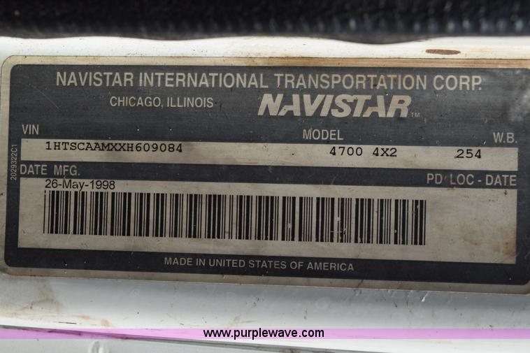 image for item K6657 1999 International 4700 dump bed chipper truck