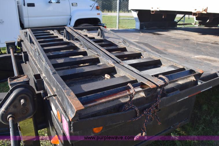image for item K6658 2004 PJ flatbed dump trailer