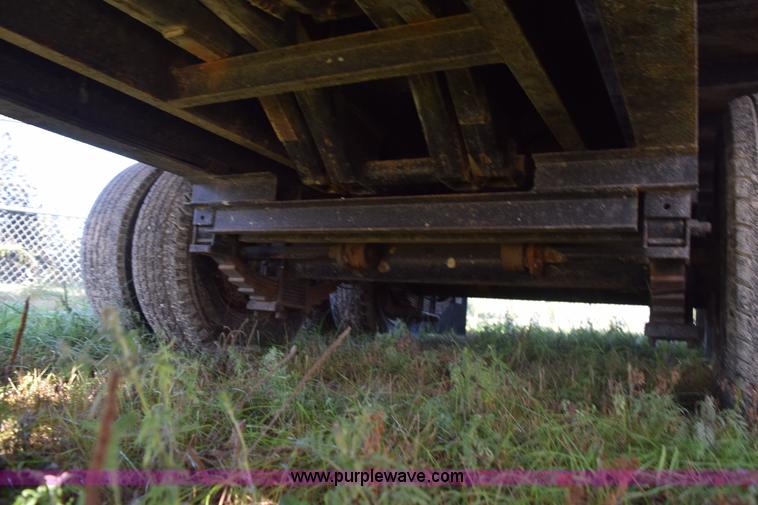 image for item K6658 2004 PJ flatbed dump trailer