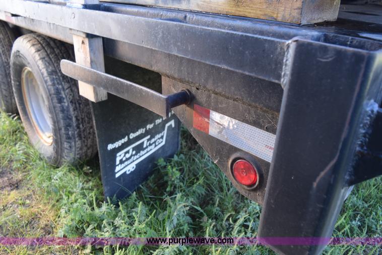 image for item K6658 2004 PJ flatbed dump trailer