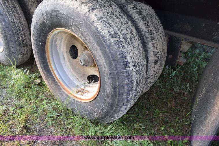 image for item K6658 2004 PJ flatbed dump trailer