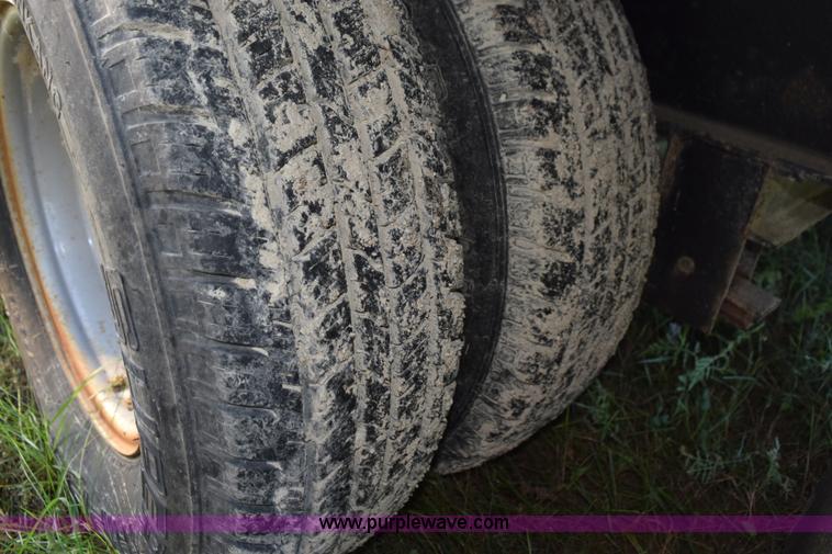 image for item K6658 2004 PJ flatbed dump trailer