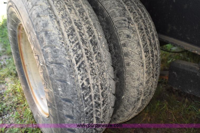 image for item K6658 2004 PJ flatbed dump trailer