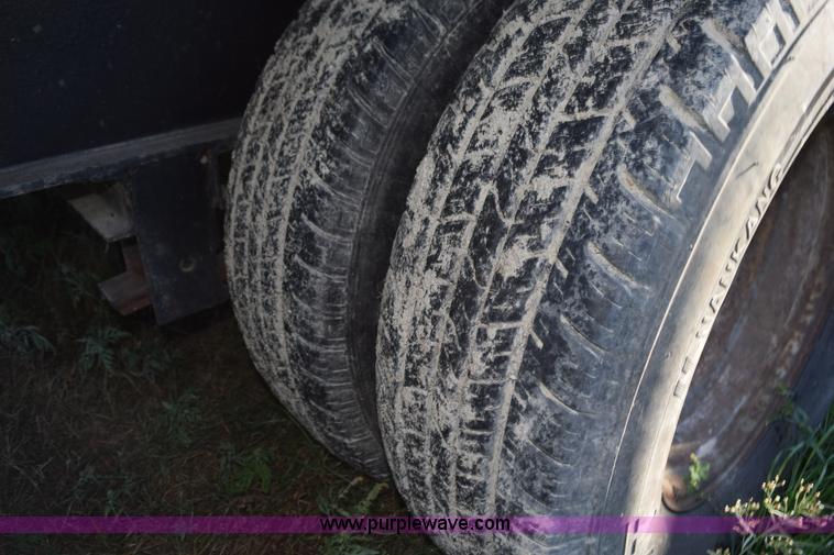 image for item K6658 2004 PJ flatbed dump trailer