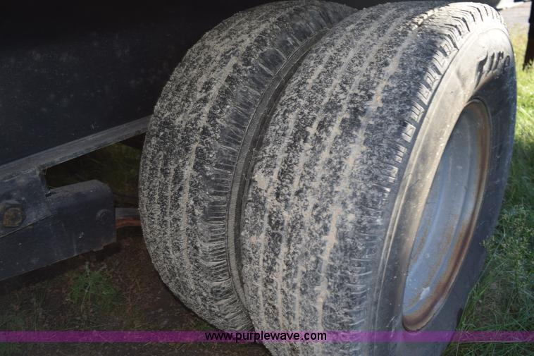 image for item K6658 2004 PJ flatbed dump trailer