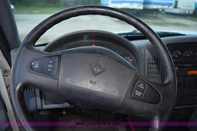 image for item K6664 2004 International DuraStar 4300 grapple truck