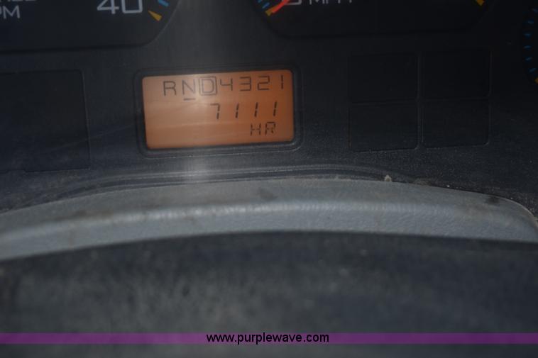 image for item K6664 2004 International DuraStar 4300 grapple truck