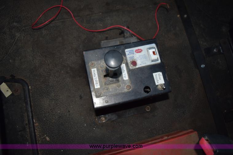 image for item K6664 2004 International DuraStar 4300 grapple truck