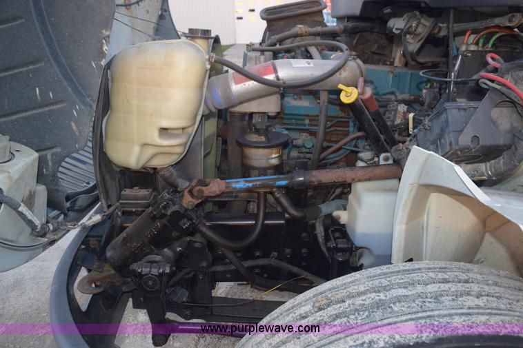 image for item K6664 2004 International DuraStar 4300 grapple truck