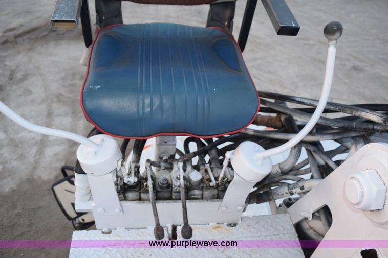 image for item K6664 2004 International DuraStar 4300 grapple truck