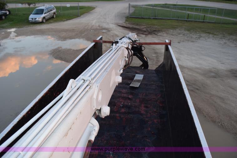 image for item K6664 2004 International DuraStar 4300 grapple truck