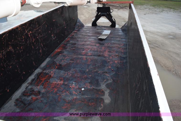 image for item K6664 2004 International DuraStar 4300 grapple truck