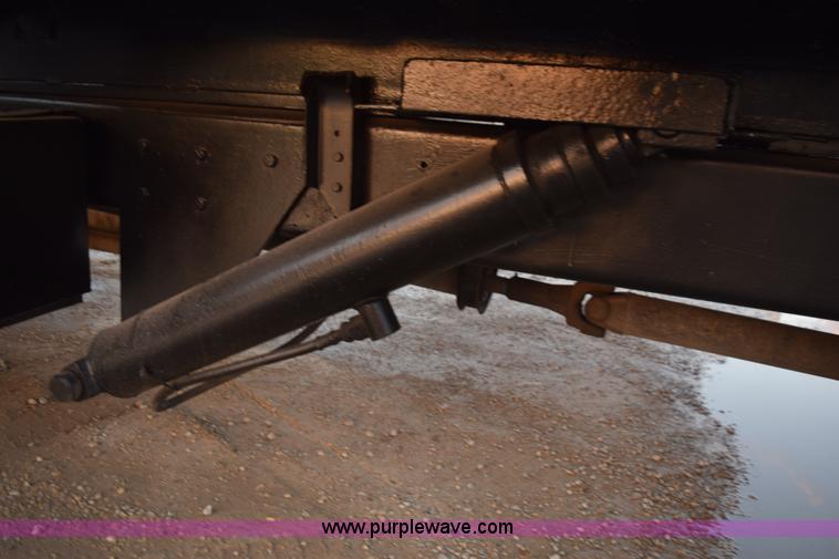 image for item K6664 2004 International DuraStar 4300 grapple truck