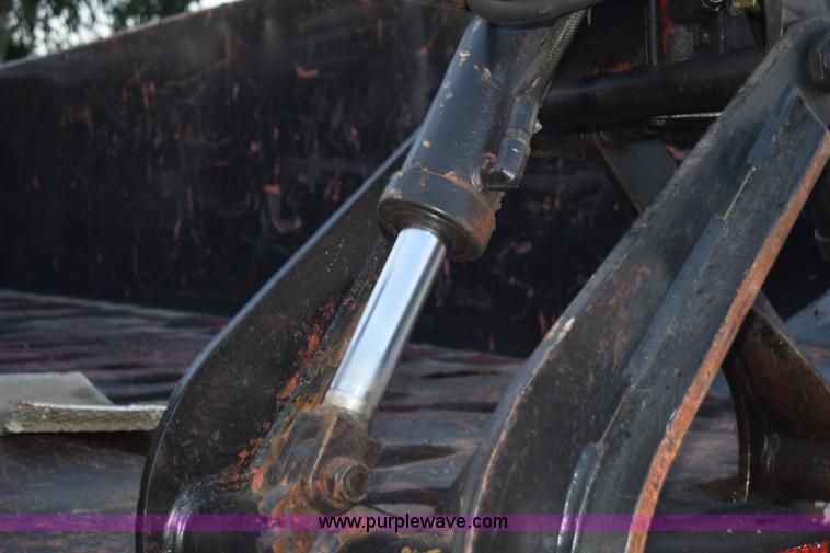 image for item K6664 2004 International DuraStar 4300 grapple truck